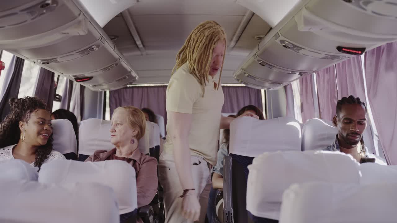 Diverse group of passengers traveling on a bus