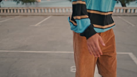 Man-feet-riding-skate-city-street-closeup.-Active-hipster-balancing-longboard