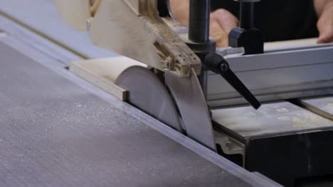 cutting process on circular saw in closeup