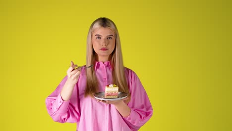 young woman enjoying a delicious cake