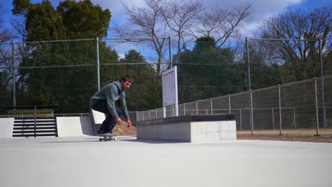 skater landing a trick on a ledge in japan