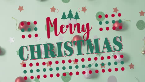 animación del texto de feliz navidad sobre las decoraciones navideñas
