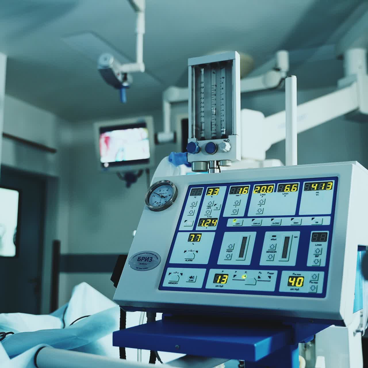 Diverse advanced equipment working in the surgery room during operation. Close up. Modern surgery room concept