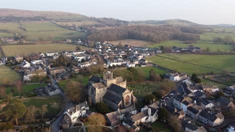 cinematic aerial drone footage of cartmel village and cartmel priory