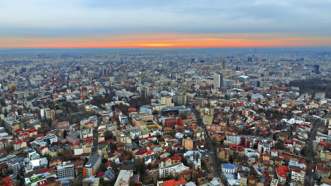 Aerial drone view of Bucharest cityscape at sunset. Blue hour in Romania