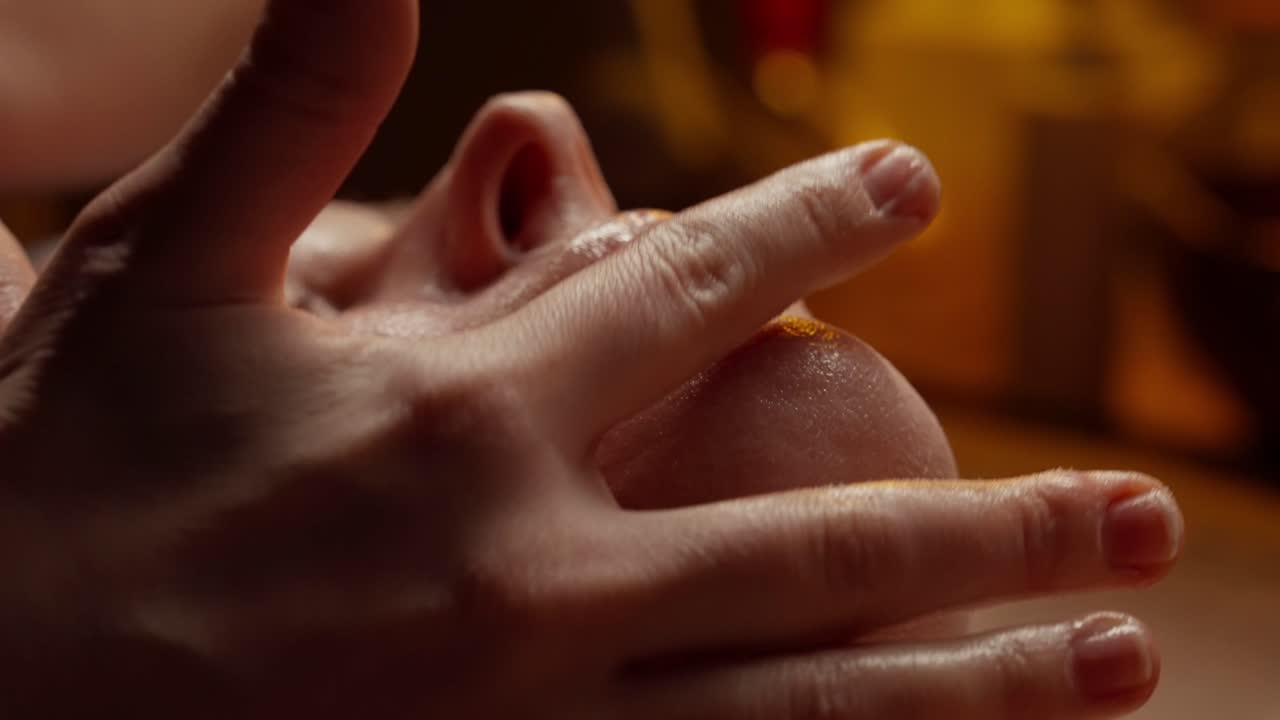 Close-up of a Person Receiving a Relaxing Facial Massage at a Spa