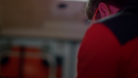 emergency doctor working at night shift in ambulance car