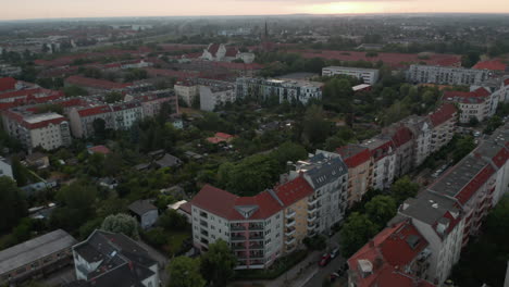 Aerial-morning-view-of-urban-neighbourhood.-Fly-above-mixture-of-various-buildings-in-city.--Berlin,-Germany
