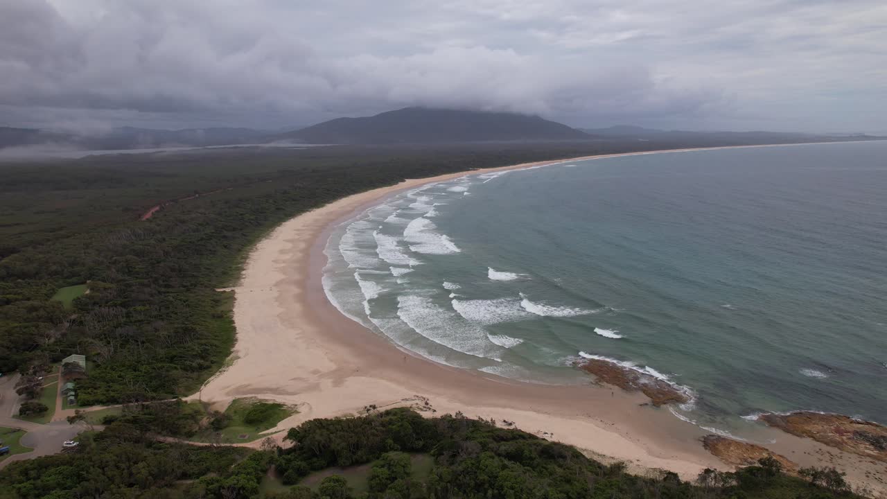Cloudy Sky Over Diamond Head Beach And Campground In Barrington Coast, New South Wales, Australia. aerial shot