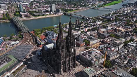 near the river rhine, the dominant cologne cathedral looks over the city