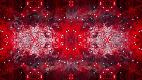 Digital-animation-of-red-kaleidoscopic-shapes-moving-in-hypnotic-motion-against-black-background