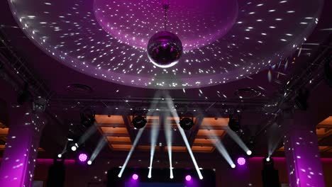 disco ball, view from below, from the disco ball beams, stage light, mirror ball