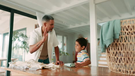 laundry, high five and a grandfather teaching