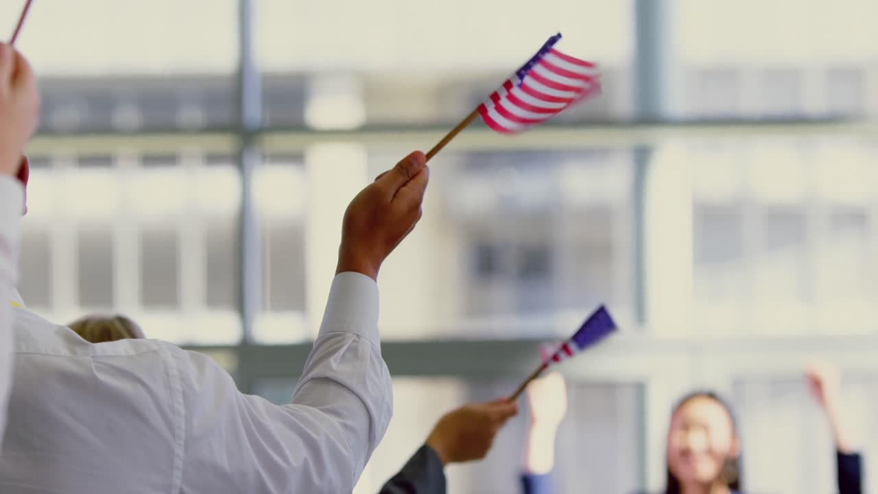 Business people waving american flag in a seminar 4k at political campaign