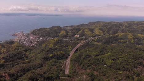 tranquil scenery of the mountain and ocean view of chiba peninsula in japan - aerial shot