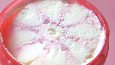 close-up of a swirled strawberry ice cream