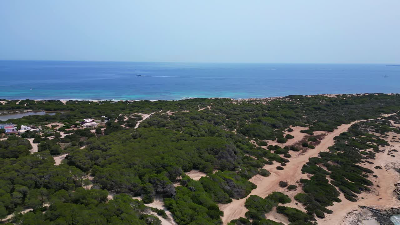 stunning beauty of Cavallet beach, with its turquoise waters and white sand, in Ibiza, Spain. Magic aerial view flight rotation to right drone