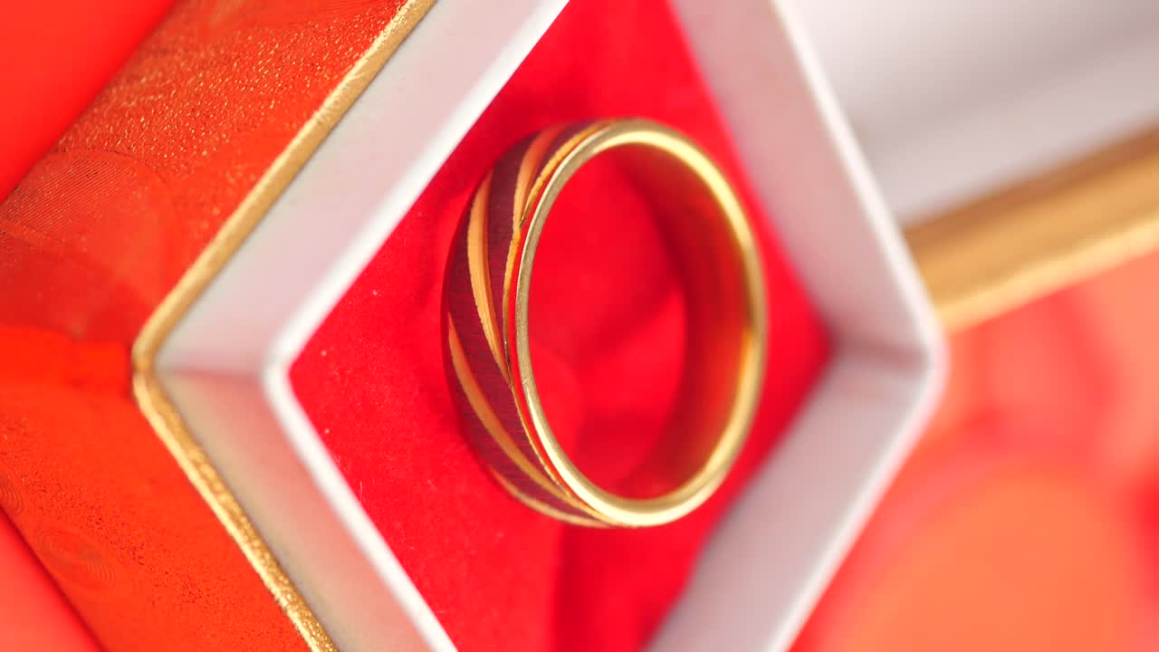 Golden Ring in a Red Box