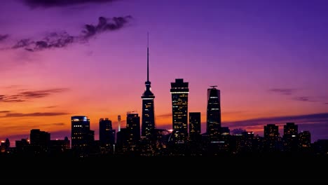 city skyline transforms during twilight, showcasing a vibrant array of colors in the evening sky