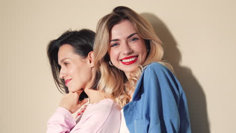 two women posing together