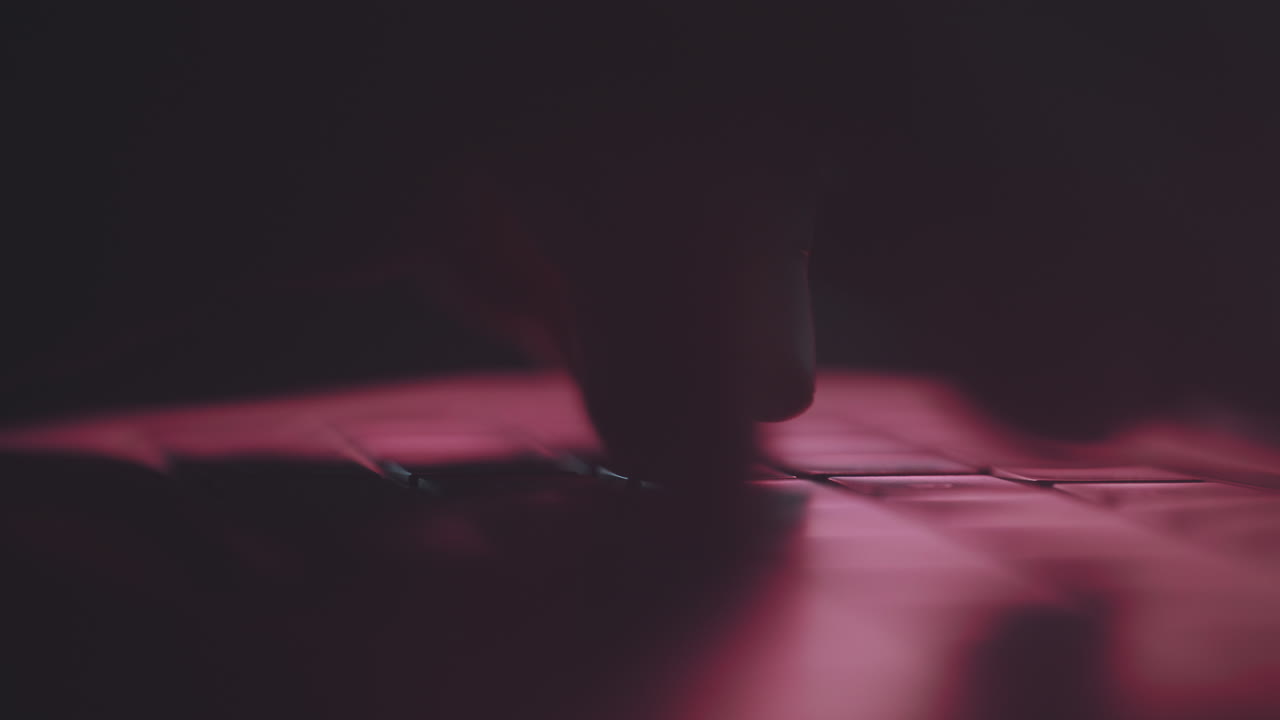 Laptop Keyboard in the Dark with Red Light