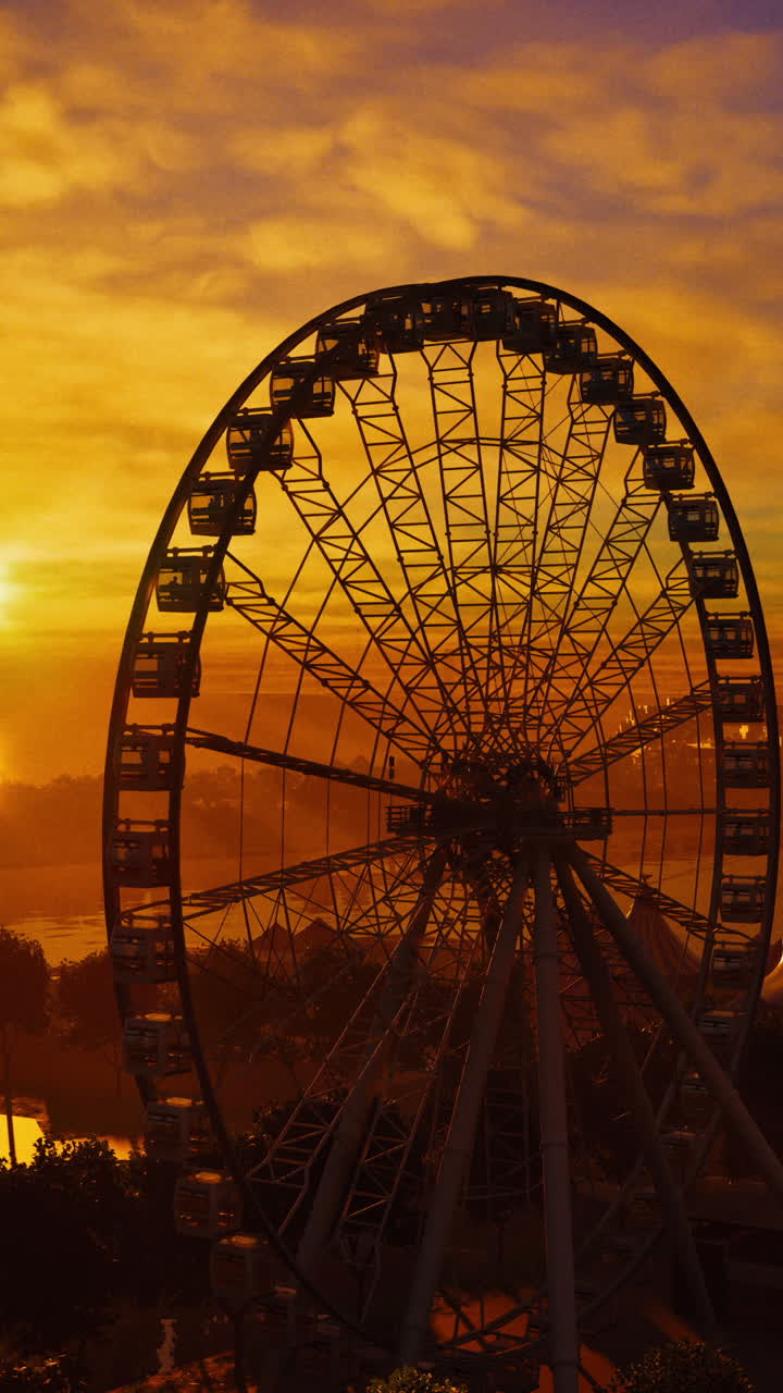 una rueda de ferris con silueta contra una puesta de sol