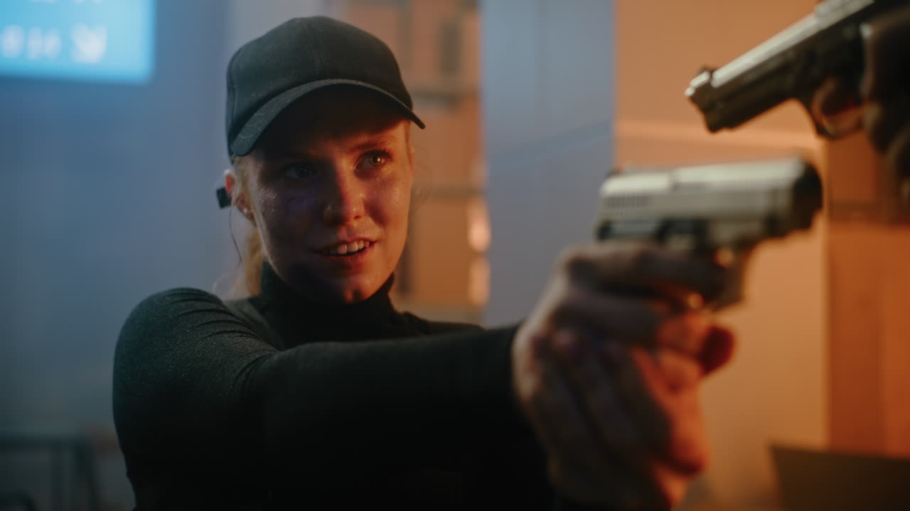 Woman practicing gun safety and target practice