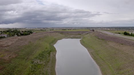 aerial view of a water spillway after a recent rain storm