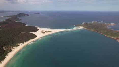 fingal bay, beach, sand spit and fingal island - calm blue sea in nsw, australia. - aerial shot