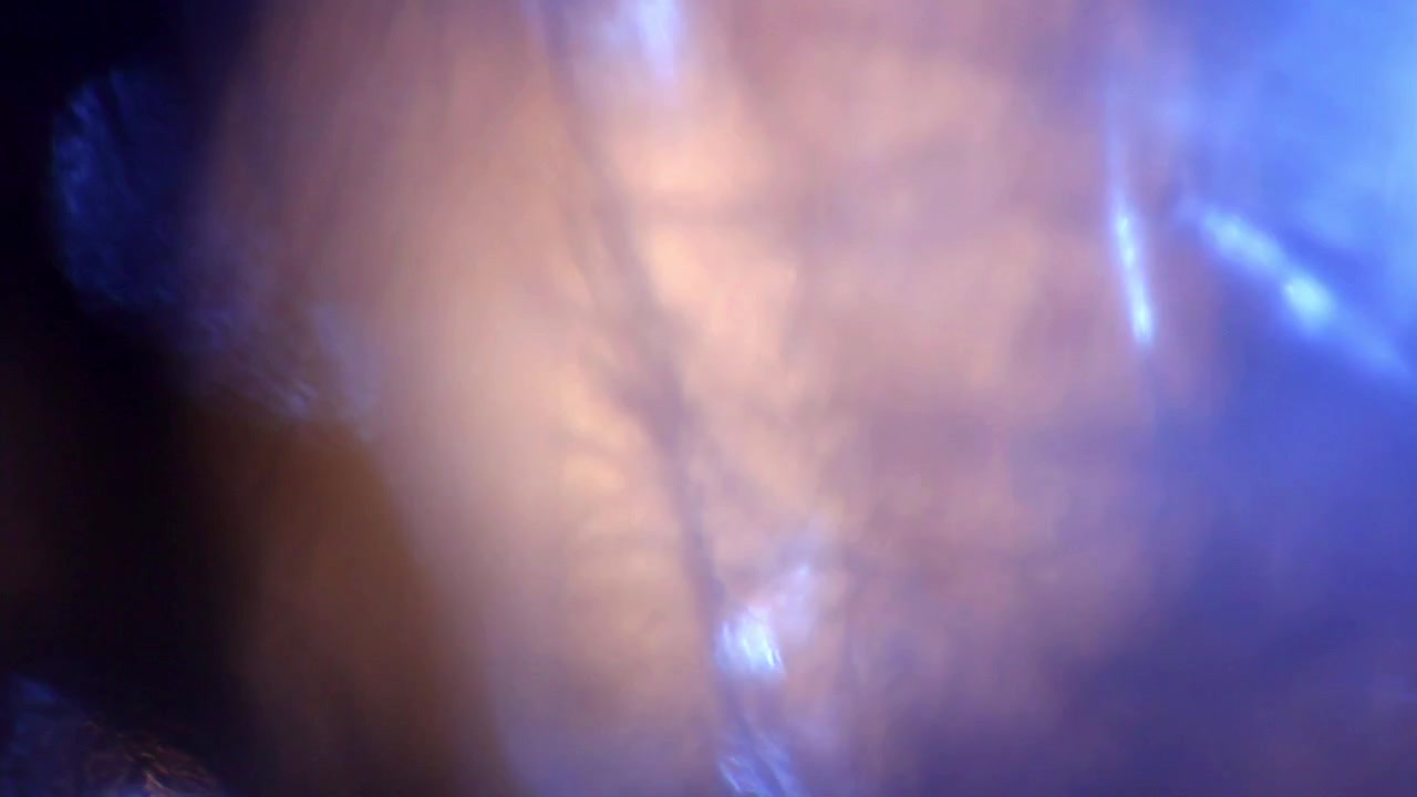 Cinematic Light Leak Overlay with Shifting Warm and Blue Tones