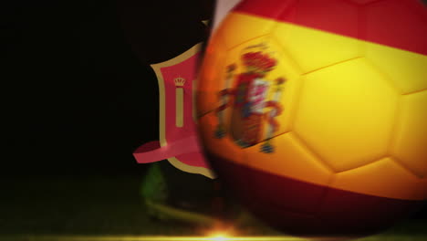 Football-player-kicking-spain-flag-ball