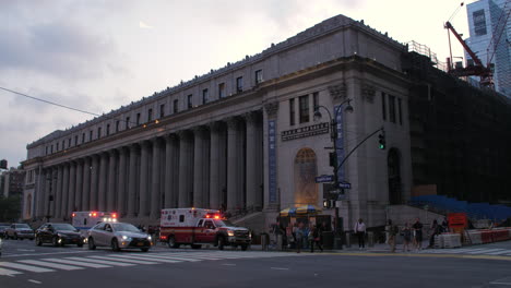 ambulances sit in front of the james farley post office in manhattan