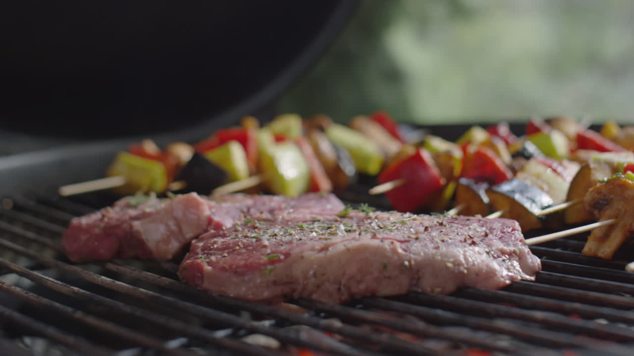 Cooking Meat and Veggie Skewers on Barbecue