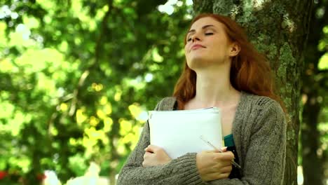 stern content woman standing in park