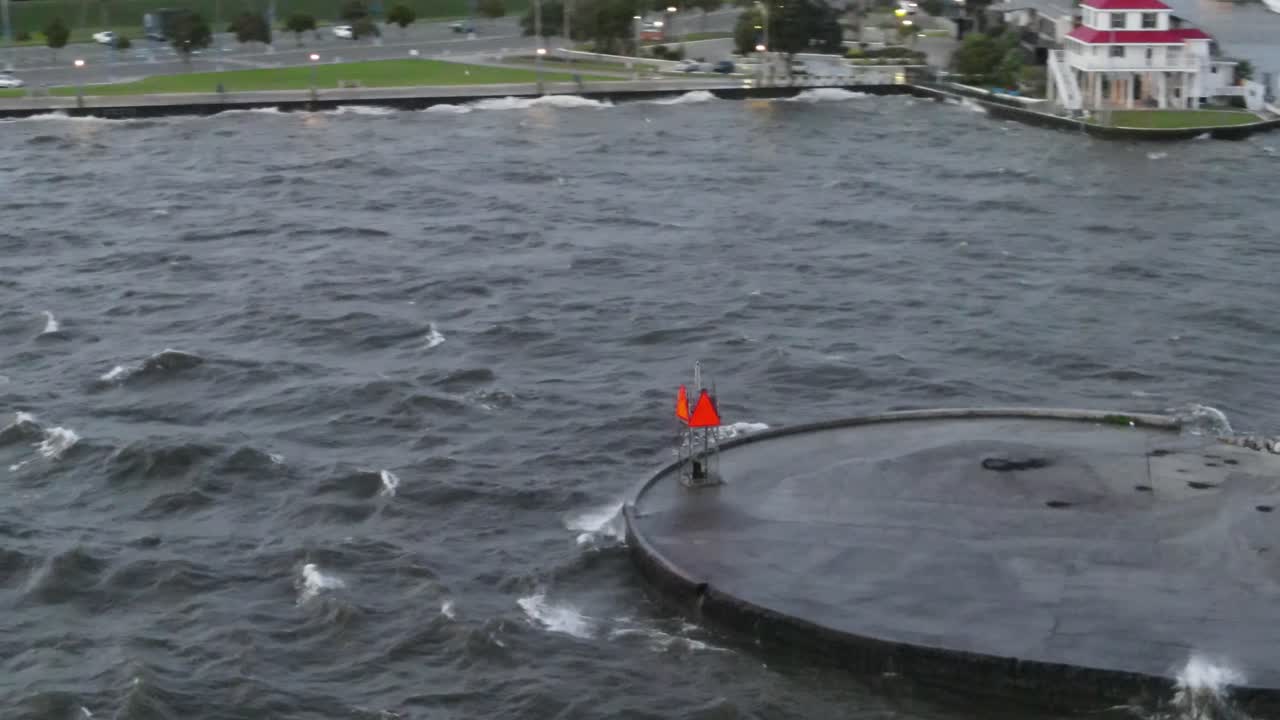 Crashing Waves Onto Breakwater At Southern Yacht Club In New Orleans, Louisiana, United States. Aerial Orbiting
