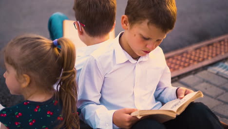 beautiful children prepare for exam reading books close view