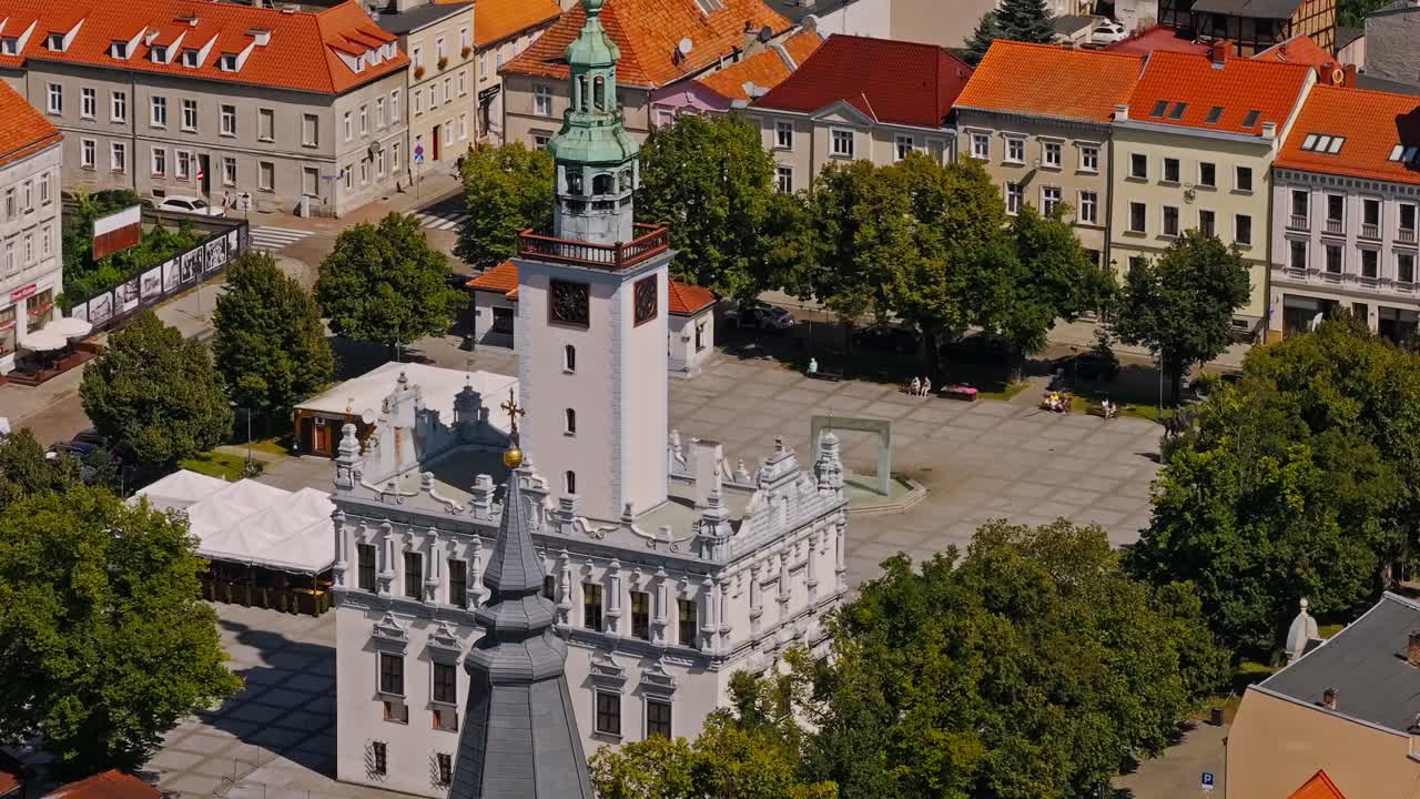 Drone cinematic retreat medium tele view of Chelmno Poland town hall tower
