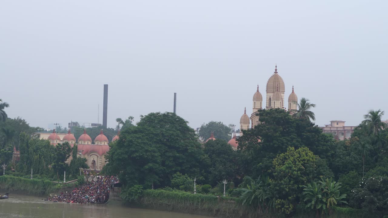 Gathering of people and Tarpan at Dakshineswar Temple in Kolkata on Mahalaya day on the eve of Durga Puja.