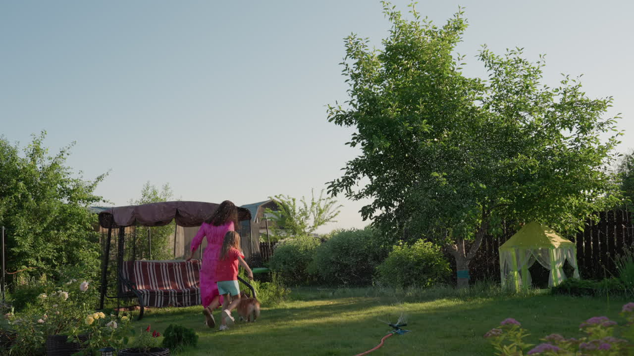 Mother And Daughter Enjoy Peaceful Yard Time, Peaceful Family Gathering In Backyard With Pet And Loved Ones Present, Enjoying Serene Outdoor Family Event With Pets And Loved Ones In Garden Atmosphere