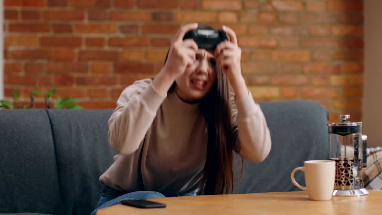 Woman Playing Video Games at Home