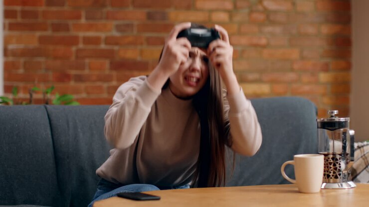 Woman Playing Video Games at Home
