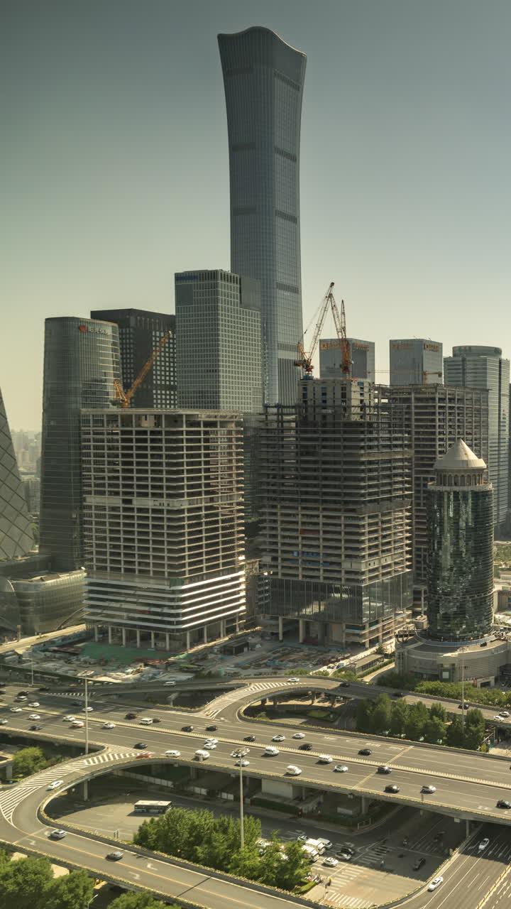 Timelapse of the Beijing city skyline from a high vantage point in vertical