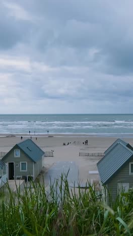 coastal beach scene with cabins