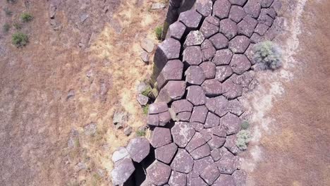 bird's eye view of exposed basalt columns in arid central wa scablands