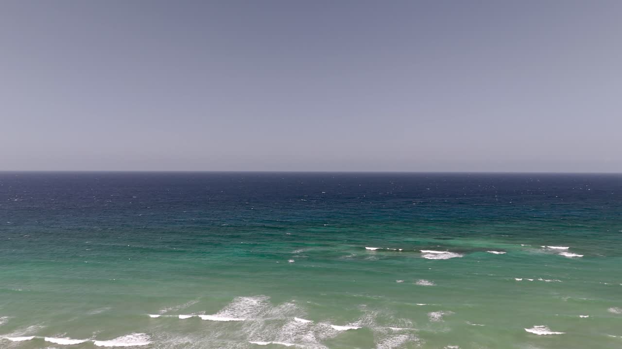 Aerial view of rough ocean on the coast line of jamaica