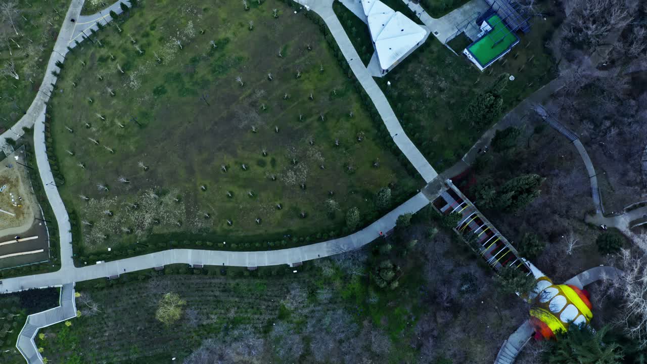 A vibrant playground and sports court in tbilisi, georgia, aerial view