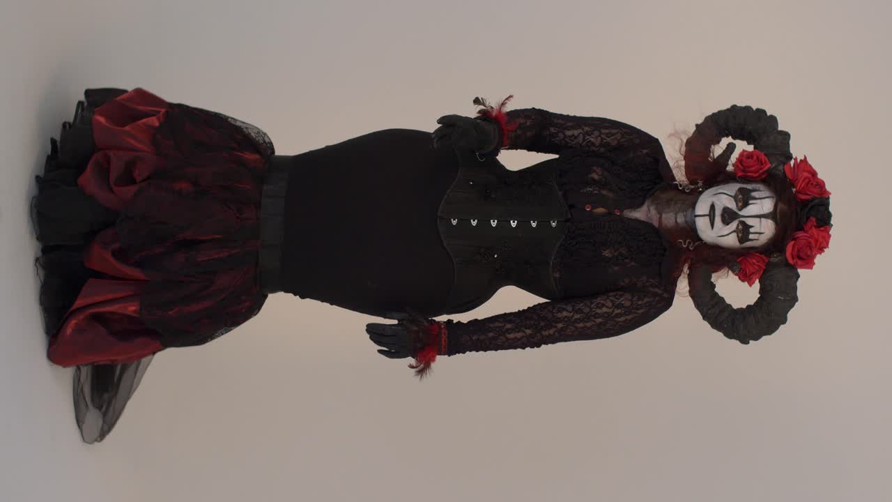 Catrina Cosplay girl moving slowly in a Light background, Full shot