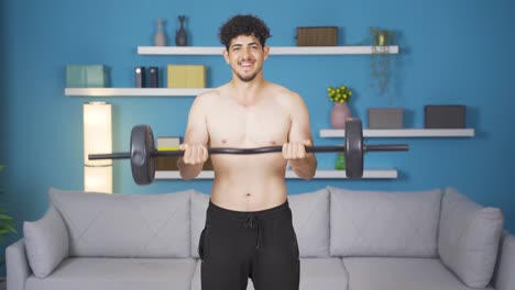 Athlete-young-man-exercising-lifts-barbell,-arm-muscle.-Muscular-body.