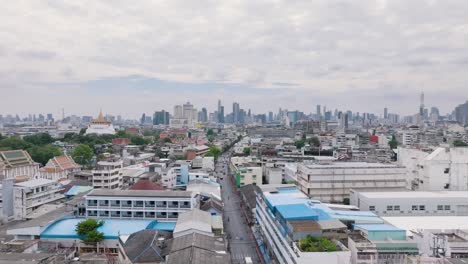 aerial view of bangkok old town cityscape with urban skyline, temple spires, and bustling streets