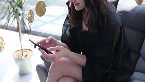 woman interacting with cryptocurrency on smartphone with floating bitcoins